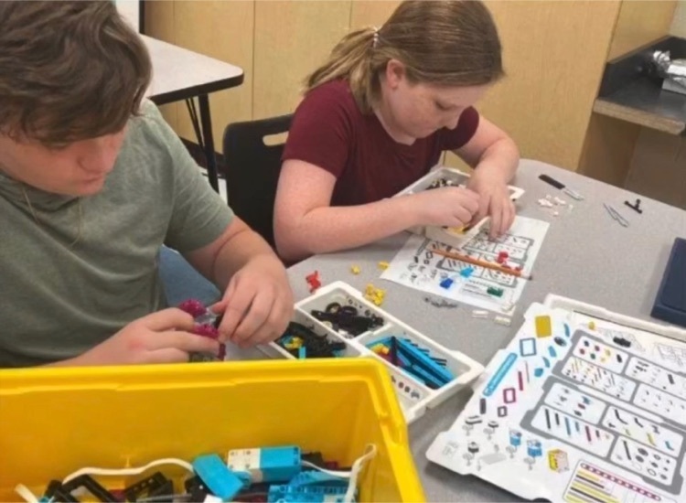 students working with legos